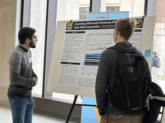 Students discuss their research at the MGU Symposium
